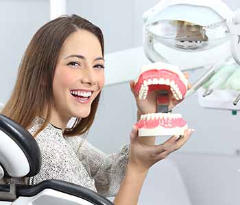 covington ga dentist describes the advantages of treatment for missing teeth with dentures 5f512a46d1395